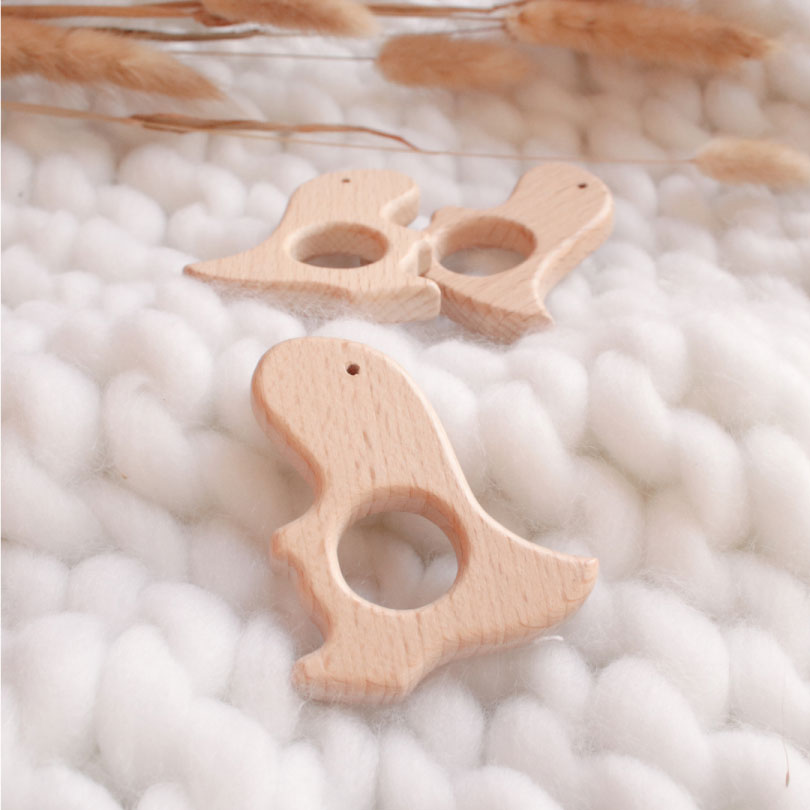 leseno-grizalo-dino Massaggiagengive in legno, giochio in legno, set regali neonato, set regalo nascita, set regalo neonato per bambini e bambine, pacchettini per la bambine i bambini, regalo nascita personalizzato, regali personalizzati per una nascita